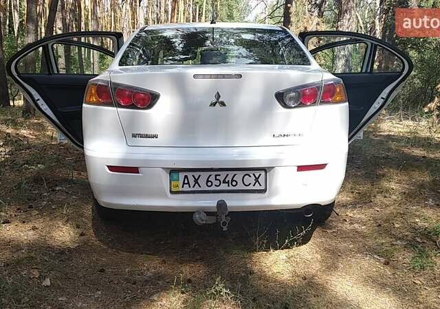 Білий Міцубісі Lancer, об'ємом двигуна 1.6 л та пробігом 155 тис. км за 9000 $, фото 6 на Automoto.ua