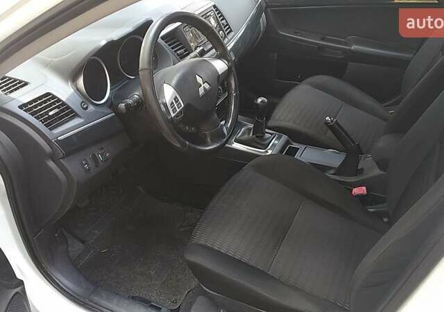 Білий Міцубісі Lancer, об'ємом двигуна 1.6 л та пробігом 155 тис. км за 9000 $, фото 10 на Automoto.ua
