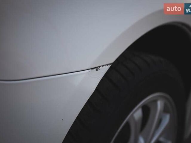 Білий Міцубісі Lancer, об'ємом двигуна 1.6 л та пробігом 247 тис. км за 8200 $, фото 11 на Automoto.ua