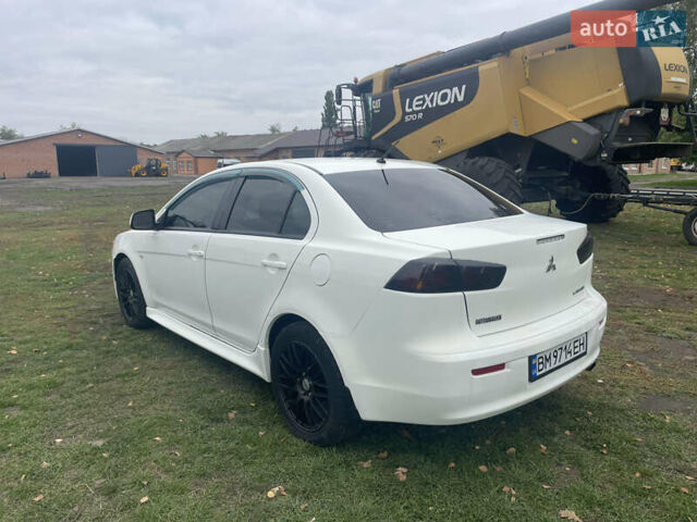 Белый Мицубиси Лансер, объемом двигателя 1.59 л и пробегом 163 тыс. км за 6700 $, фото 7 на Automoto.ua