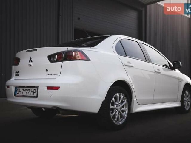 Білий Міцубісі Lancer, об'ємом двигуна 1.6 л та пробігом 247 тис. км за 8200 $, фото 1 на Automoto.ua