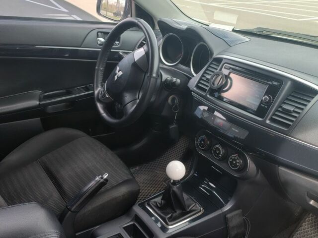 Белый Мицубиси Лансер, объемом двигателя 1.6 л и пробегом 260 тыс. км за 8700 $, фото 3 на Automoto.ua