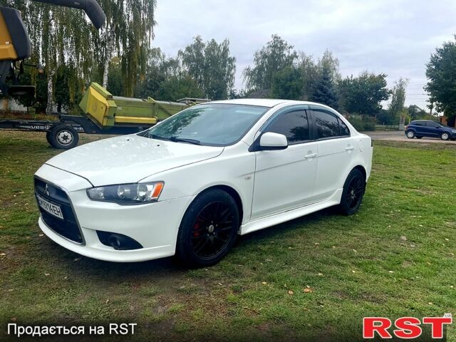Білий Міцубісі Lancer, об'ємом двигуна 1.6 л та пробігом 162 тис. км за 6500 $, фото 1 на Automoto.ua