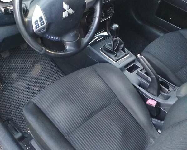 Белый Мицубиси Лансер, объемом двигателя 1.59 л и пробегом 110 тыс. км за 7300 $, фото 13 на Automoto.ua