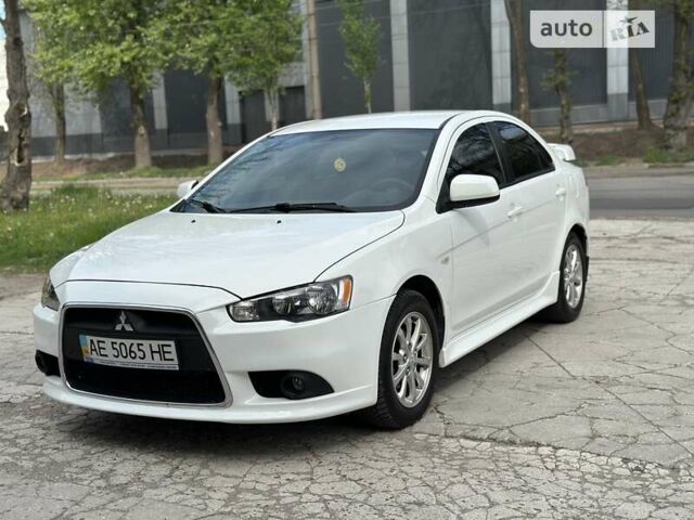 Білий Міцубісі Lancer, об'ємом двигуна 1.58 л та пробігом 99 тис. км за 8500 $, фото 3 на Automoto.ua