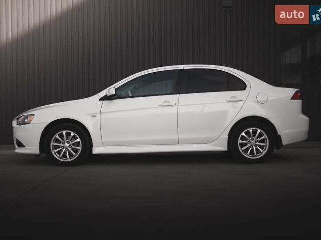 Білий Міцубісі Lancer, об'ємом двигуна 1.6 л та пробігом 247 тис. км за 8200 $, фото 3 на Automoto.ua