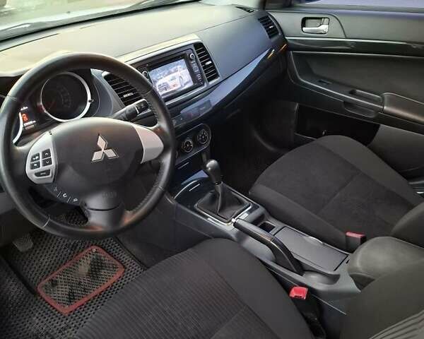 Білий Міцубісі Lancer, об'ємом двигуна 1.6 л та пробігом 260 тис. км за 6500 $, фото 2 на Automoto.ua