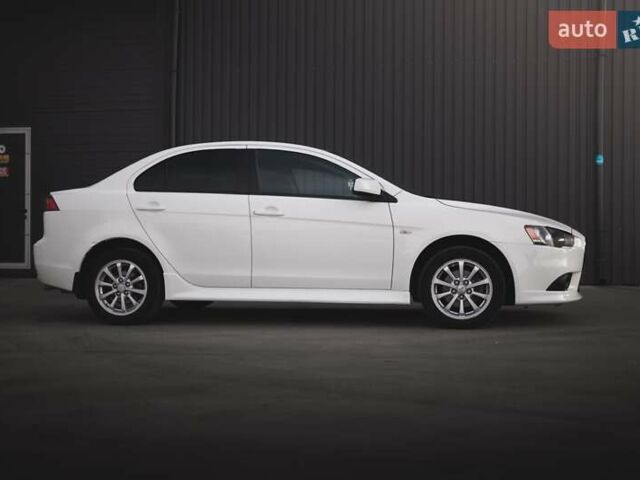 Білий Міцубісі Lancer, об'ємом двигуна 1.6 л та пробігом 247 тис. км за 8200 $, фото 2 на Automoto.ua