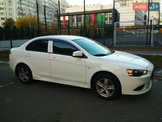 Белый Мицубиси Лансер, объемом двигателя 1.59 л и пробегом 110 тыс. км за 7300 $, фото 2 на Automoto.ua