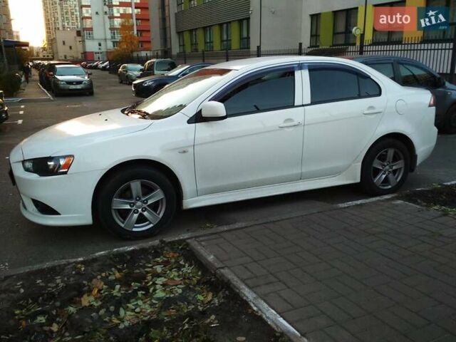Белый Мицубиси Лансер, объемом двигателя 1.59 л и пробегом 110 тыс. км за 7300 $, фото 3 на Automoto.ua