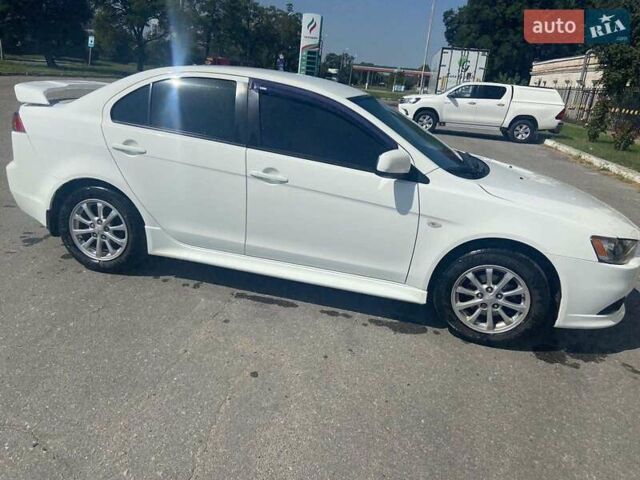 Белый Мицубиси Лансер, объемом двигателя 1.6 л и пробегом 238 тыс. км за 8500 $, фото 2 на Automoto.ua