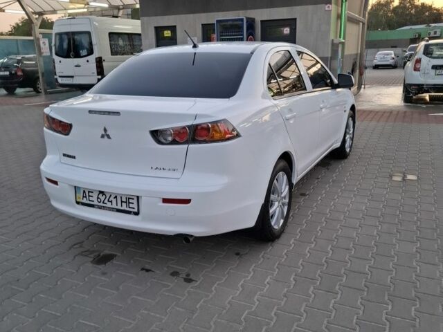Белый Мицубиси Лансер, объемом двигателя 1.6 л и пробегом 260 тыс. км за 6500 $, фото 2 на Automoto.ua