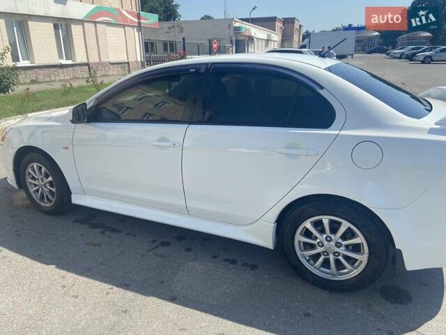 Белый Мицубиси Лансер, объемом двигателя 1.6 л и пробегом 238 тыс. км за 8500 $, фото 7 на Automoto.ua