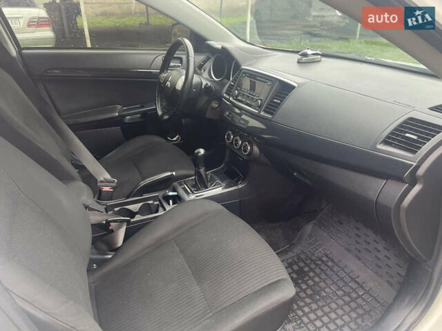 Белый Мицубиси Лансер, объемом двигателя 1.59 л и пробегом 163 тыс. км за 6700 $, фото 9 на Automoto.ua