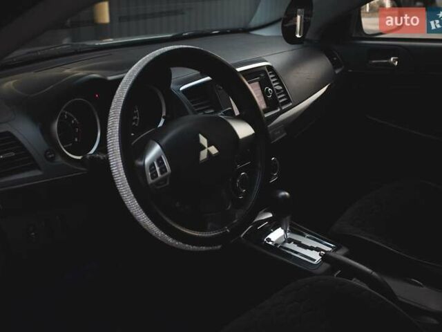 Білий Міцубісі Lancer, об'ємом двигуна 1.6 л та пробігом 247 тис. км за 8200 $, фото 12 на Automoto.ua