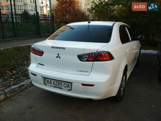 Белый Мицубиси Лансер, объемом двигателя 1.59 л и пробегом 110 тыс. км за 7300 $, фото 4 на Automoto.ua