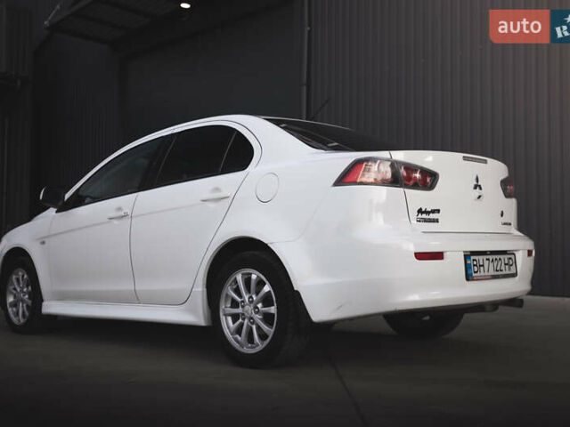 Білий Міцубісі Lancer, об'ємом двигуна 1.6 л та пробігом 248 тис. км за 8500 $, фото 6 на Automoto.ua