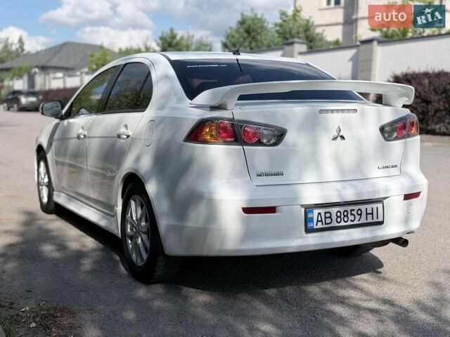 Білий Міцубісі Lancer, об'ємом двигуна 2 л та пробігом 135 тис. км за 8400 $, фото 1 на Automoto.ua