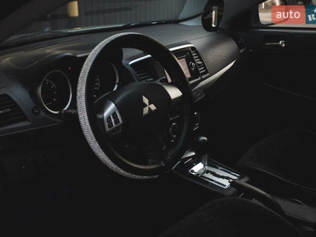 Білий Міцубісі Lancer, об'ємом двигуна 1.6 л та пробігом 248 тис. км за 8500 $, фото 28 на Automoto.ua