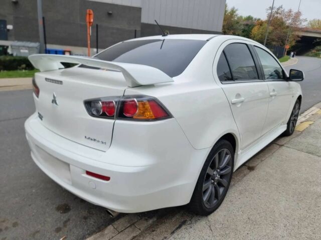 Белый Мицубиси Лансер, объемом двигателя 1.8 л и пробегом 82 тыс. км за 8800 $, фото 5 на Automoto.ua