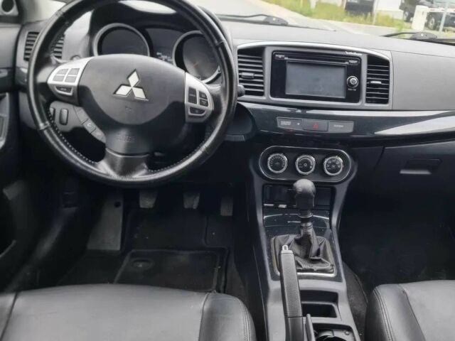 Белый Мицубиси Лансер, объемом двигателя 1.8 л и пробегом 82 тыс. км за 8800 $, фото 7 на Automoto.ua