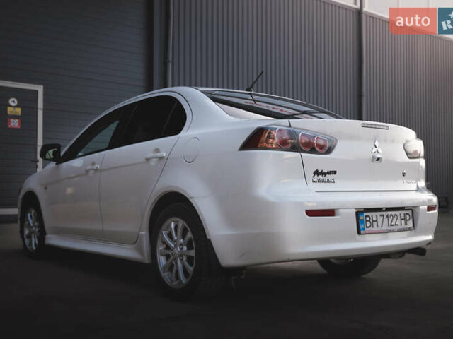 Білий Міцубісі Lancer, об'ємом двигуна 1.6 л та пробігом 248 тис. км за 8500 $, фото 14 на Automoto.ua