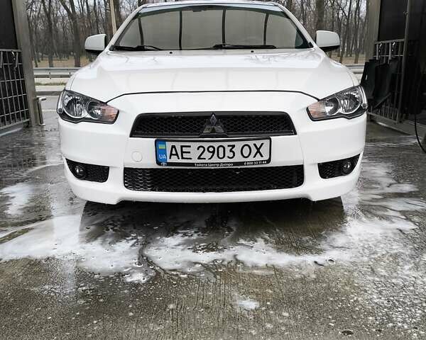 Белый Мицубиси Лансер, объемом двигателя 2 л и пробегом 130 тыс. км за 8800 $, фото 1 на Automoto.ua