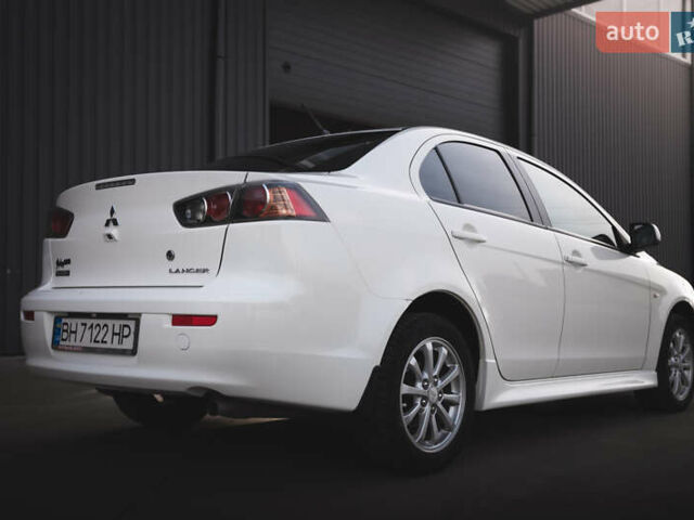 Білий Міцубісі Lancer, об'ємом двигуна 1.6 л та пробігом 248 тис. км за 8500 $, фото 2 на Automoto.ua