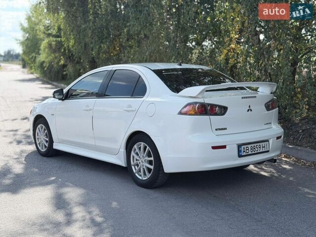 Білий Міцубісі Lancer, об'ємом двигуна 2 л та пробігом 135 тис. км за 8400 $, фото 14 на Automoto.ua