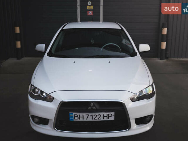 Білий Міцубісі Lancer, об'ємом двигуна 1.6 л та пробігом 248 тис. км за 8500 $, фото 7 на Automoto.ua