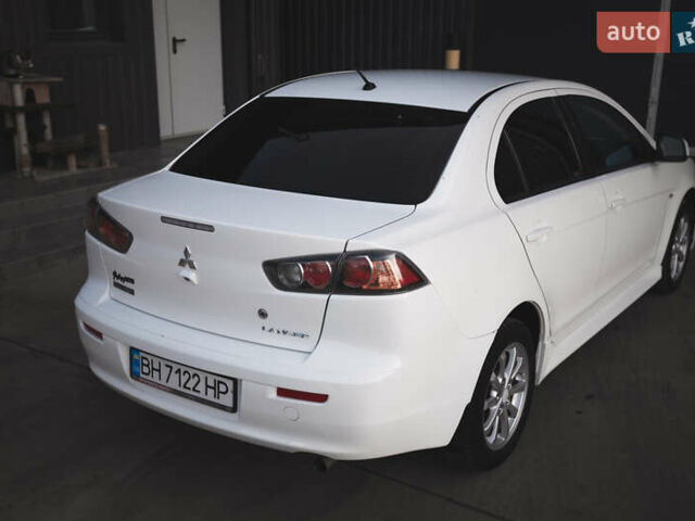 Білий Міцубісі Lancer, об'ємом двигуна 1.6 л та пробігом 248 тис. км за 8500 $, фото 16 на Automoto.ua