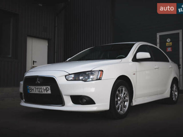 Білий Міцубісі Lancer, об'ємом двигуна 1.6 л та пробігом 248 тис. км за 8500 $, фото 9 на Automoto.ua