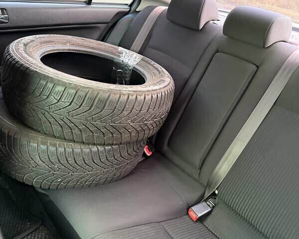 Білий Міцубісі Lancer, об'ємом двигуна 2 л та пробігом 146 тис. км за 7700 $, фото 4 на Automoto.ua