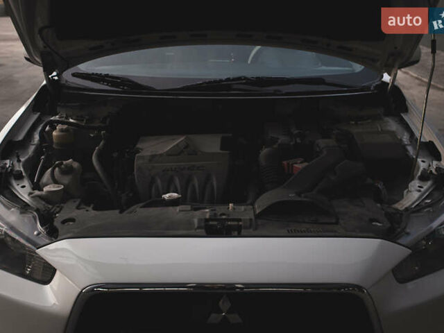 Білий Міцубісі Lancer, об'ємом двигуна 1.6 л та пробігом 248 тис. км за 8500 $, фото 29 на Automoto.ua