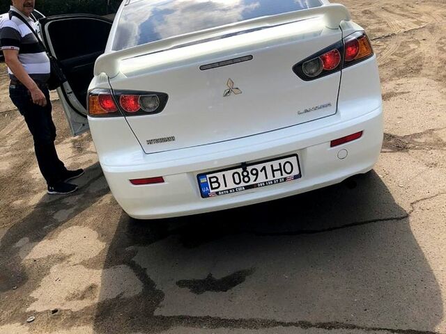 Білий Міцубісі Lancer, об'ємом двигуна 2 л та пробігом 150 тис. км за 9800 $, фото 2 на Automoto.ua