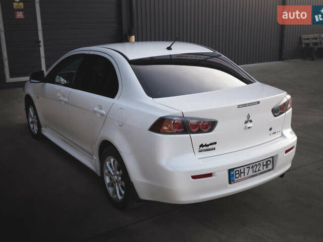 Білий Міцубісі Lancer, об'ємом двигуна 1.6 л та пробігом 248 тис. км за 8500 $, фото 17 на Automoto.ua
