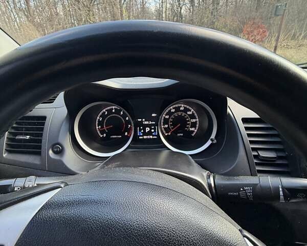 Білий Міцубісі Lancer, об'ємом двигуна 2 л та пробігом 146 тис. км за 7700 $, фото 6 на Automoto.ua