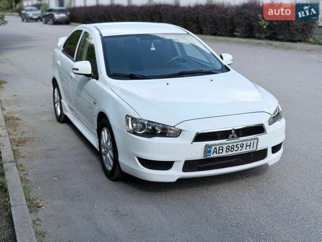 Білий Міцубісі Lancer, об'ємом двигуна 2 л та пробігом 135 тис. км за 8400 $, фото 9 на Automoto.ua