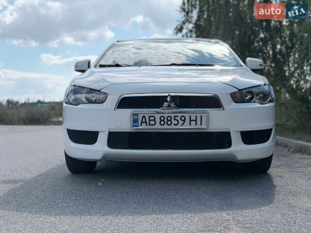 Білий Міцубісі Lancer, об'ємом двигуна 2 л та пробігом 135 тис. км за 8400 $, фото 3 на Automoto.ua