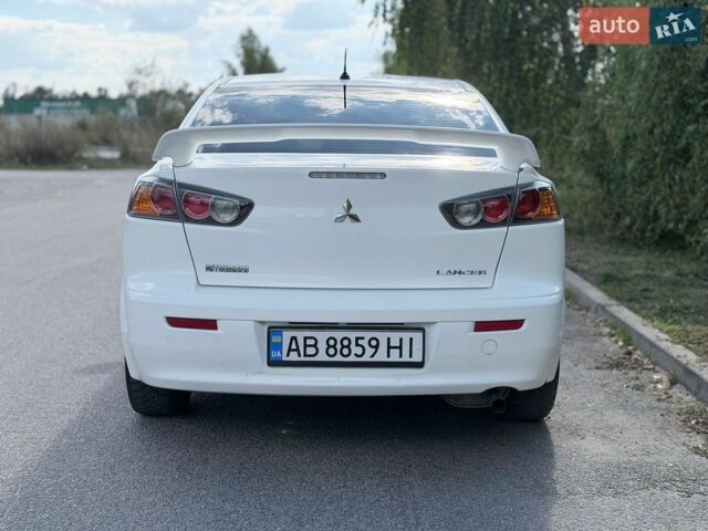 Білий Міцубісі Lancer, об'ємом двигуна 2 л та пробігом 135 тис. км за 8400 $, фото 7 на Automoto.ua