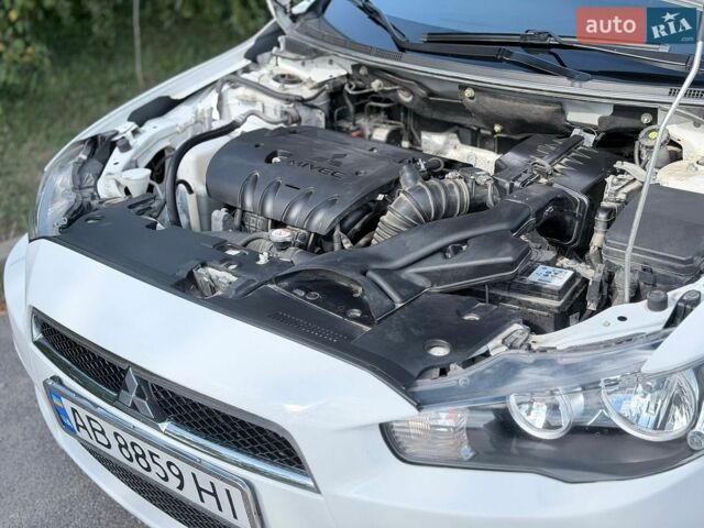 Білий Міцубісі Lancer, об'ємом двигуна 2 л та пробігом 135 тис. км за 8400 $, фото 6 на Automoto.ua