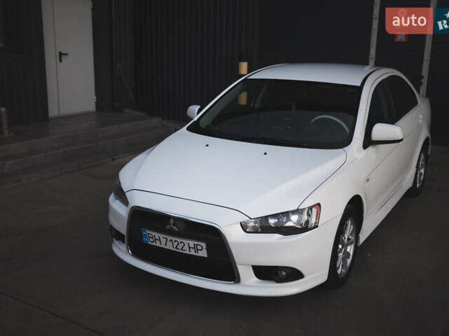 Білий Міцубісі Lancer, об'ємом двигуна 1.6 л та пробігом 248 тис. км за 8500 $, фото 11 на Automoto.ua