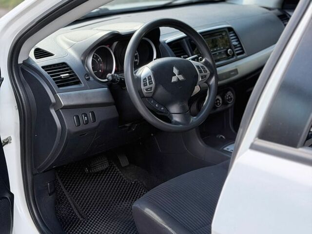 Білий Міцубісі Lancer, об'ємом двигуна 2 л та пробігом 135 тис. км за 8400 $, фото 12 на Automoto.ua
