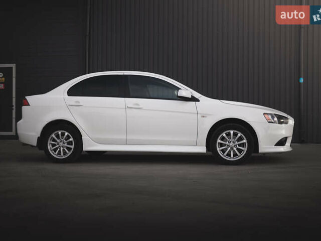 Білий Міцубісі Lancer, об'ємом двигуна 1.6 л та пробігом 248 тис. км за 8500 $, фото 3 на Automoto.ua