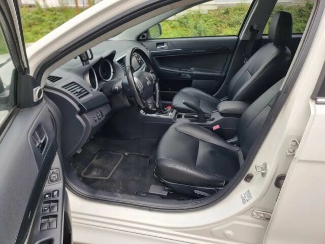 Белый Мицубиси Лансер, объемом двигателя 1.8 л и пробегом 82 тыс. км за 8800 $, фото 6 на Automoto.ua