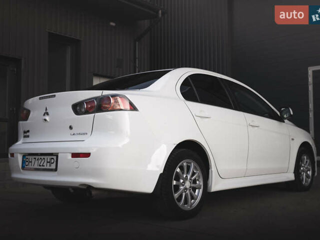Білий Міцубісі Lancer, об'ємом двигуна 1.6 л та пробігом 248 тис. км за 8500 $, фото 15 на Automoto.ua