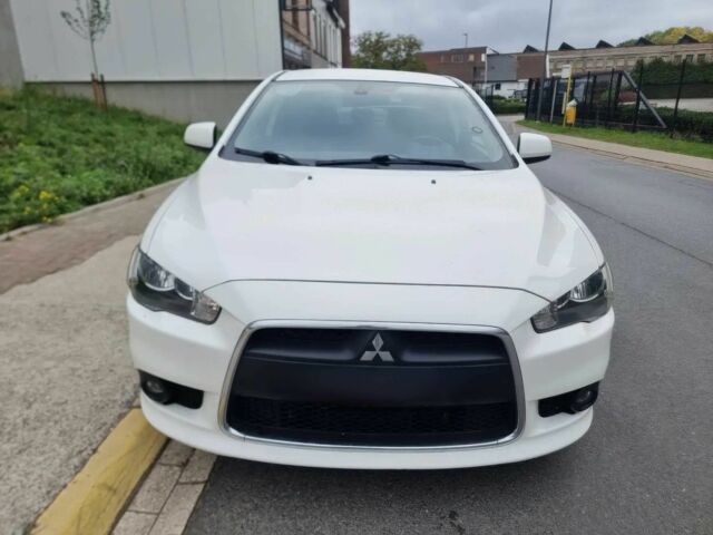 Белый Мицубиси Лансер, объемом двигателя 1.8 л и пробегом 82 тыс. км за 8800 $, фото 1 на Automoto.ua