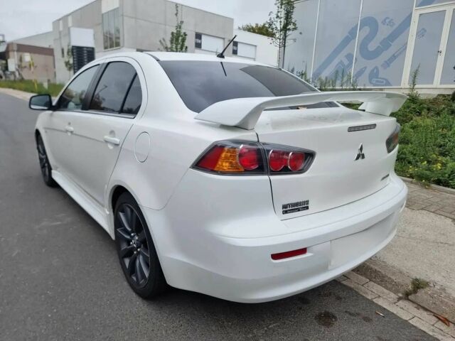 Белый Мицубиси Лансер, объемом двигателя 1.8 л и пробегом 82 тыс. км за 8800 $, фото 3 на Automoto.ua
