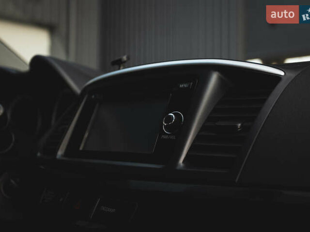 Білий Міцубісі Lancer, об'ємом двигуна 1.6 л та пробігом 248 тис. км за 8500 $, фото 20 на Automoto.ua