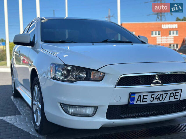 Білий Міцубісі Lancer, об'ємом двигуна 2 л та пробігом 165 тис. км за 7899 $, фото 1 на Automoto.ua